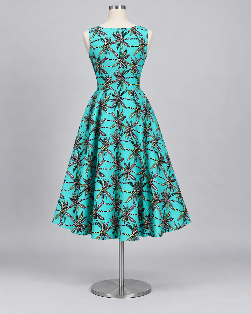 Stitched style reference - turquoise tropical palm print linen frock back view