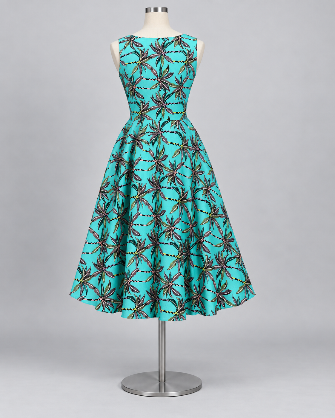 Stitched style reference - turquoise tropical palm print linen frock back view